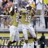 ORLANDO, FL - SEPTEMBER 15:  Defensive back Joe Burnett #19 of the University of Central Florida Knights celebrates an interception with defensive back Darin Baldwin at Bright House Networks Stadium on September 15, 2007 in Orlando, Florida.  The sixth-ra