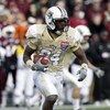 MEMPHIS, TN - DECEMBER 29:  Kevin Smith #24 of the UCF Knights runs against the Mississippi State Bulldogs during the 49th Annual Autozone Liberty Bowl at Liberty Bowl Memorial Stadium December 29, 2007 in Memphis, Tennessee.  (Photo by Joe Murphy/Getty I