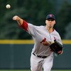 DENVER - SEPTEMBER 25:  Starting pitcher Chris Carpenter #29 of the St. Louis Cardinals delivers against the Colorado Rockies at Coors Field on September 25, 2009 in Denver, Colorado. The Rockies defeated the Cardinals 2-1.  (Photo by Doug Pensinger/Getty
