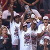 30 Aug 1997:  Cynthia Cooper of the Houston Comets celebrates with her teammates after the championship game against the New York Liberty at The Summit in Houston, Texas.  The Comets won the game, 65-51. Mandatory Credit: Todd Warshaw  /Allsport