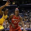 LOS ANGELES - AUGUST 25:  Sheryl Swoopes #22 of the Houston Comets drives to the basket past Mwadi Mabika#4 of the Los Angeles Sparks on August 25, 2003 at Staples Center in Los Angeles, California.  The Sparks won 67-84.  NOTE TO USER: User expressly ack