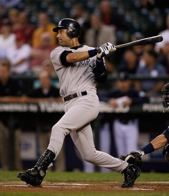 SEATTLE - SEPTEMBER 18:  Derek Jeter #2 of the New York Yankees singles in the first inning against the Seattle Mariners on September 18, 2009 at Safeco Field in Seattle, Washington. (Photo by Otto Greule Jr/Getty Images)
