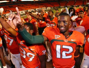 FORT LAUDERDALE, FL - SEPTEMBER 17:  Quarterback Jacory Harris #12 of the Miami Hurricanes celebrates after defeating the Georgia Tech Yellow Jackets at Land Shark Stadium on September 17, 2009 in Fort Lauderdale, Florida. Miami defeated Georgia Tech 33-1