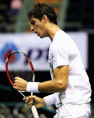BANGKOK, THAILAND - SEPTEMBER 28:  Thomaz Belluci of Brazil celebrates a point in his match against Guillermo Garcia-Lopez of Spain during day three of the 2009 Thailand Open at Impact Arena on September 28, 2009 in Bangkok, Thailand.  (Photo by Mark Dads