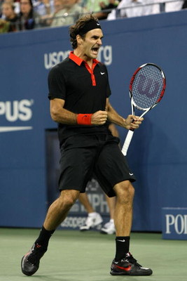 NEW YORK - SEPTEMBER 14:  Roger Federer of Switzerland celebrates a break point in the fourth set during the Men's Singles final against Juan Martin Del Potro of Argentina on day fifteen of the 2009 U.S. Open at the USTA Billie Jean King National Tennis C
