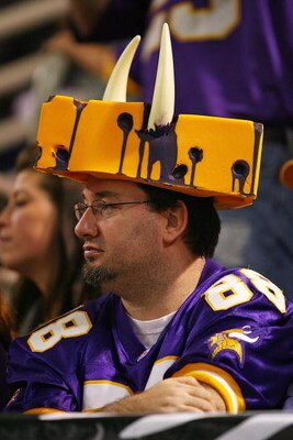 MINNEAPOLIS - SEPTEMBER 27: A fan of the Minnesota Vikings wears a foam 'cheesehead' with horns attached during a game between the Vikings and the San Francisco 49ers at the Hubert H. Humphrey Metrodome on September 27, 2009 in Minneapolis, Minnesota. (Ph