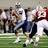 ARLINGTON, TX - SEPTEMBER 05:  Quarterback Max Hall #15 of the Brigham Young Cougars drops back to pass against the Oklahoma Sooners at Cowboys Stadium on September 5, 2009 in Arlington, Texas.  (Photo by Ronald Martinez/Getty Images)