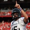 PISCATAWAY, NJ - SEPTEMBER 07:  Tony Pike #15 of the Cincinnati Bearcats celebrates a touchdown against the Rutgers Scarlet Knights at Rutgers Stadium on September 7, 2009 in Piscataway, New Jersey.   by Jim McIsaac/Getty Images)