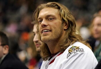 DALLAS - JANUARY 23:  WWE wrestler 'Edge' watches the 2007 NHL Youngstars Game at the American Airlines Center on January 23, 2007 in Dallas, Texas.  (Photo by Jim McIsaac/Getty Images)
