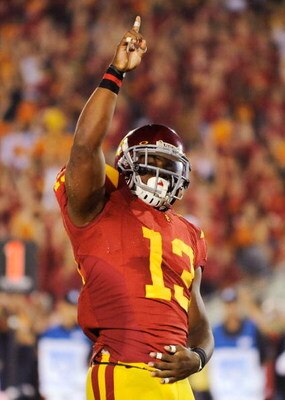 LOS ANGELES, CA - SEPTEMBER 26:  Stafon Johnson#13 of the USC Trojans celebrates his touchdown against the Washington State Cougars during the fourth quarter of the college football game at the Los Angeles Memorial Coliseum on September 26, 2009 in Los An