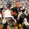 EAST RUTHERFORD, NJ - SEPTEMBER 27:  Mark Sanchez #6 of The New York Jets talks to his offense during the game against The Tennessee Titans during their game on September 27, 2009 at Giants Stadium in East Rutherford, New Jersey.  (Photo by Al Bello/Getty