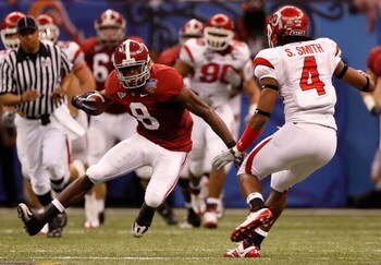 NEW ORLEANS - JANUARY 02:  Wide receiver Julio Jones #8 of the Alabama Crimson Tide looks to make a move on Sean Smith #4 of the Utah Utes after making a catch in the second quarter during the 75th Allstate Sugar Bowl at the Louisiana Superdome on January