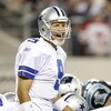 ARLINGTON, TX - SEPTEMBER 28:  Tony Romo #9 of the Dallas Cowboys calls a play gainst the Carolina Panthers at Cowboys Stadium on September 28, 2009 in Arlington, Texas. (Photo by Ronald Martinez/Getty Images)