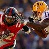 BATON ROUGE, LA - NOVEMBER 22:  Dexter McCluster #22 of the Ole Miss Rebels is tackled by Kelvin Sheppard #11 of the Louisiana State University Tigers on November 22, 2008 at Tiger Stadium in Baton Rouge, Louisiana.  (Photo by Chris Graythen/Getty Images)