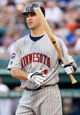 ARLINGTON, TX - JULY 17:  Catcher Joe Mauer #7 of the Minnesota Twins on July 17, 2009 at Rangers Ballpark in Arlington, Texas.  (Photo by Ronald Martinez/Getty Images)