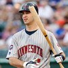 ARLINGTON, TX - JULY 17:  Catcher Joe Mauer #7 of the Minnesota Twins on July 17, 2009 at Rangers Ballpark in Arlington, Texas.  (Photo by Ronald Martinez/Getty Images)