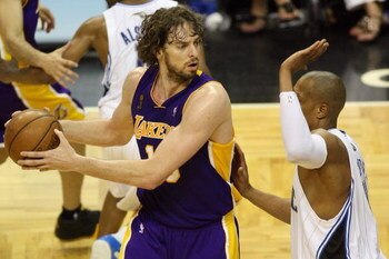 ORLANDO, FL - JUNE 9:  Pau Gasol #16 of the Los Angeles Lakers looks to maneuver against Tony Battie #4 of the Orlando Magic in Game Three of the 2009 NBA Finals on June 9, 2009 at Amway Arena in Orlando, Florida.  The Magic won 108-104.  NOTE TO USER:  U