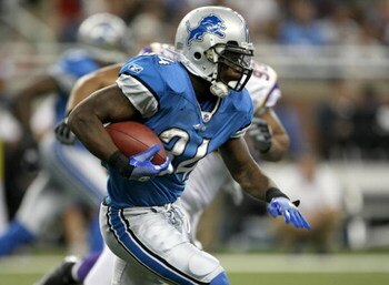 DETROIT - SEPTEMBER 20:  Running back Kevin Smith #34 of the Detroit Lions carries the ball against the Minnesota Vikings at Ford Field on September 20, 2009 in Detroit, Michigan. The Vikings won 27-13.  (Photo by Stephen Dunn/Getty Images)