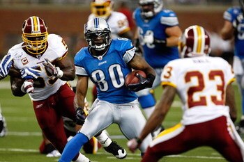 DETROIT, MI - SEPTEMBER 27: Wide receiver Bryant Johnson #80 of the Detroit Lions runs with the football against the Washington Redskins at Ford Field on September 27, 2009 in Detroit, Michigan. The Lions defeated the Redskins 19-14. (Photo by Scott Boehm