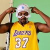 EL SEGUNDO, CA - SEPTEMBER 29: Ron Artest #37 of the Los Angeles Lakers hwears a mask while taping a public announcement for the Los Angeles Dodgers during Lakers media day at the Lakers training facility on September 29, 2009 in El Segundo, California. N