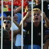 SKOPJE - SEPTEMBER 6:  Macedonian fans goad the English players during the Euro 2004, group 7 qualifying match between Macedonia and England on September 6, 2003 at the City Stadium in Skopje, Macedonia.  England won the match 2-1.  (Photo by Jamie McDona