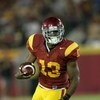 LOS ANGELES - SEPTEMBER 23:  Running back Stafon Johnson #13 of the USC Trojans carries the ball against the Washington State Cougars on September 23, 2009 at the Los Angeles Coliseum in Los Angeles, California.  USC won 27-6.   (Photo by Stephen Dunn/Get