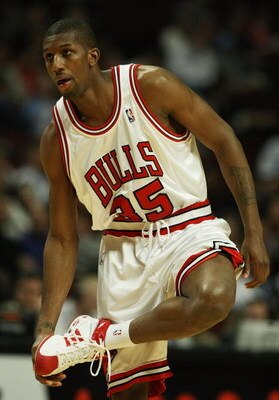 CHICAGO - MARCH 20:  Demetris Nichols #35 of the Chicago Bulls wipes down his shoes after entering a game against the San Antonio Spurs on March 20, 2008 at the United Center in Chicago, Illinois. The Spurs defeated the Bulls 102-80. NOTE TO USER: User ex