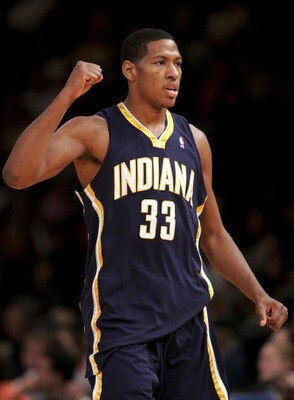 NEW YORK - NOVEMBER 4:  Danny Granger #33 of the Indiana Pacers celebrates a basket against the New York Knicks on November 4, 2006 at Madison Square Garden in New York City. NOTE TO USER: User expressly acknowledges and agrees that, by downloading and/or