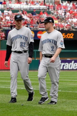 ST. LOUIS, MO - JULY 14:  American League All-Stars Roy Halladay and Aaron Hill of the Toronto Blue Jays look on before the 2009 MLB All-Star Game at Busch Stadium on July 14, 2009 in St Louis, Missouri. (Photo by Jamie Squire/Getty Images)