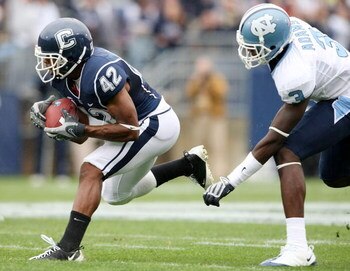 EAST HARTFORD, CT - SEPTEMBER 12:  Robert McClain #42 of the Connecticut Huskies intercepts a pass intended for Joshua Adams #3 of the North Carolinia Tar Heels on September 12, 2009 at Rentschler Field in East Hartford, Connecticut.  (Photo by Elsa/Getty