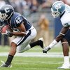 EAST HARTFORD, CT - SEPTEMBER 12:  Robert McClain #42 of the Connecticut Huskies intercepts a pass intended for Joshua Adams #3 of the North Carolinia Tar Heels on September 12, 2009 at Rentschler Field in East Hartford, Connecticut.  (Photo by Elsa/Getty