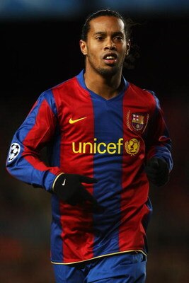 BARCELONA, SPAIN - MARCH 04:  Ronaldinho of Barcelona looks on during the UEFA Champions League 2nd leg of the First knockout round match between FC Barcelona and Celtic at the Camp Nou stadium on March 4, 2007 in Barcelona, Spain.  (Photo by Ryan Pierse/
