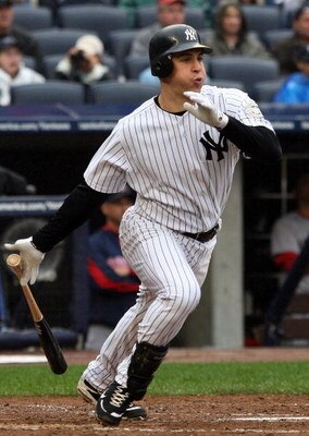 NEW YORK - SEPTEMBER 27:  Mark Teixeira #25 of the New York Yankees bats against the Boston Red Sox on September 27, 2009 at Yankee Stadium in the Bronx borough of New York City.  (Photo by Jim McIsaac/Getty Images)