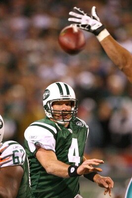 EAST RUTHERFORD, NJ - DECEMBER 28: Brett Favre #4 of The New York Jetspasses the ball against The Miami Dolphins during their game on December 28, 2008 at Giants Stadium in East Rutherford, New Jersey. (Photo by Al Bello/Getty Images)