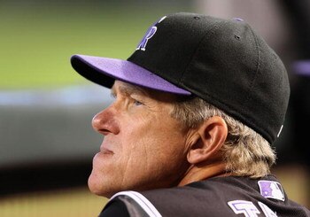 PHOENIX - SEPTEMBER 20:  Manager Jim Tracy of the Colorado Rockies watches from the dugout during the major league baseball game against the Arizona Diamondbacks at Chase Field on September 20, 2009 in Phoenix, Arizona.  (Photo by Christian Petersen/Getty