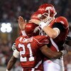 ARLINGTON, TX - OCTOBER 03:  Quarterback Ryan Mallett #15 celelbrates a touchdown with Michael Smith #21 of the Arkansas Razorbacks against the Texas A&M Aggies at Dallas Cowboys Stadium on October 3, 2009 in Arlington, Texas.  (Photo by Ronald Martinez/G