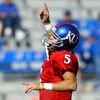 LAWRENCE, KS - SEPTEMBER 26:  Quarterback Todd Reesing #5 of the Kansas Jayhawks reacts during warm-ups just prior to the start of the game against the Southern Mississippi Golden Eagles on September 26, 2009 at Memorial Stadium in Lawrence, Kansas.  (Pho