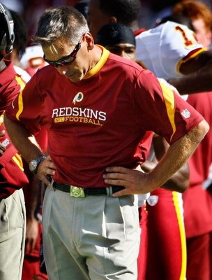 LANDOVER, MD - SEPTEMBER 20:  Head coach Jim Zorn of the Washington Redskins watches as his team runs out the clock against the St. Louis Rams during their game on September 20, 2009 at FedEx Field in Landover, Maryland.  The Redskins defeated the Rams by