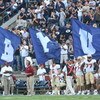 PROVO, UT. - SEPTEMBER 19:  Brigham Young Cougars flag bearers run around the field after a touchdown against the Florida State Seminoles at La Vell Edwards Stadium on September 19, 2009 in Provo, Utah.  (Photo by Melissa Majchrzak/Getty Images)