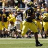 ANN ARBOR, MI - SEPTEMBER 19:  Running back Carlos Brown #23 of the Michigan Wolverines breaks away on  a 90 yard touchdown run against the Eastern Michigan Eagles at Michigan Stadium on September 19, 2009 in Ann Arbor, Michigan.  (Photo by Stephen Dunn/G