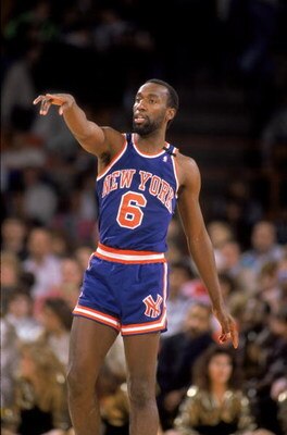 DENVER - 1989:  Trent Tucker #6 of the New York Knicks points his finger during an NBA game against the Denver Nuggets at McNichols Sports Arena in Denver, Colorado in 1989.  (Photo by: Tim Defrisco/Getty Images)