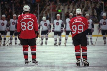 16 Feb 1998:  Eric Lindros (left) and Wayne Gretzky face the USA team  in the final round game of ice hockey at the Big Hat stadium in the 1998 Olympic Winter Games in Nagano, Japan. \ Mandatory Credit: Doug Pensinger /Allsport