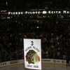 CHICAGO - NOVEMBER 12:  A banner retiring the number of former Chicago Blackhawks defenseman and NHL hall of famer Pierre Pilote is raised during a ceremony before the Chicago Blackhawks Boston Bruins game at the United Center on November 12, 2008 in Chic