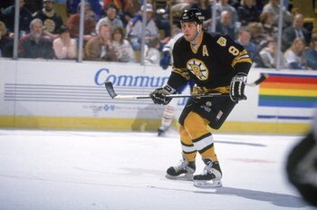 BUFFALO, NY - FEBRUARY 12:  Cam Neely #8 of the Boston Bruins pursues the play during the game against the Buffalo Sabres on February 12, 1995 in Buffalo, New York. The Sabres defeated the Bruins 2-1. (Photo by Rick Stewart/Getty Images)