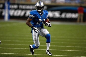 DETROIT, MI - AUGUST 28: Running back Aaron Brown #21 of the Detroit Lions runs with the football against the Indianapolis Colts at Ford Field on August 28, 2009 in Detroit, Michigan.  The Lions defeated the Colts 18-17. (Photo by Scott Boehm/Getty Images