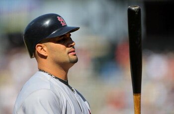 DENVER - SEPTEMBER 27:  Albert Pujols #5 of the St. Louis Cardinals takes an at bat against the Colorado Rockies at Coors Field on September 27, 2009 in Denver, Colorado. The Rockies defeated the Cardinals 4-3.  (Photo by Doug Pensinger/Getty Images)