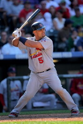 DENVER - SEPTEMBER 27:  Albert Pujols #5 of the St. Louis Cardinals takes an at bat against the Colorado Rockies at Coors Field on September 27, 2009 in Denver, Colorado. The Rockies defeated the Cardinals 4-3.  (Photo by Doug Pensinger/Getty Images)