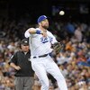LOS ANGELES, CA - OCTOBER 02:  Casey Blake #23 of the Los Angeles Dodgers makes an off balance throw for an out against the Colorado Rockies during the sixth inning on October 2, 2009 in Los Angeles, California.  (Photo by Harry How/Getty Images)