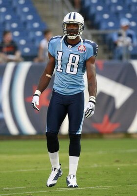 NASHVILLE, TN - SEPTEMBER 3: Kenny Britt #18 of the Tennessee Titans looks on against the Green Bay Packers during a preseason NFL game at LP Field on September 3, 2009 in Nashville, Tennessee. The Titans beat the Packers 27-13. (Photo by Joe Murphy/Getty