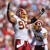 LANDOVER, MD - OCTOBER 4:  Cornelius Griffin #96 of the Washington Redskins rouses the crowd against the Tampa Bay Buccaneers at FedExField on October 4, 2009 in Landover, Maryland. The Redskins defeated the Buccaneers 16-13. (Photo by Larry French/Getty 